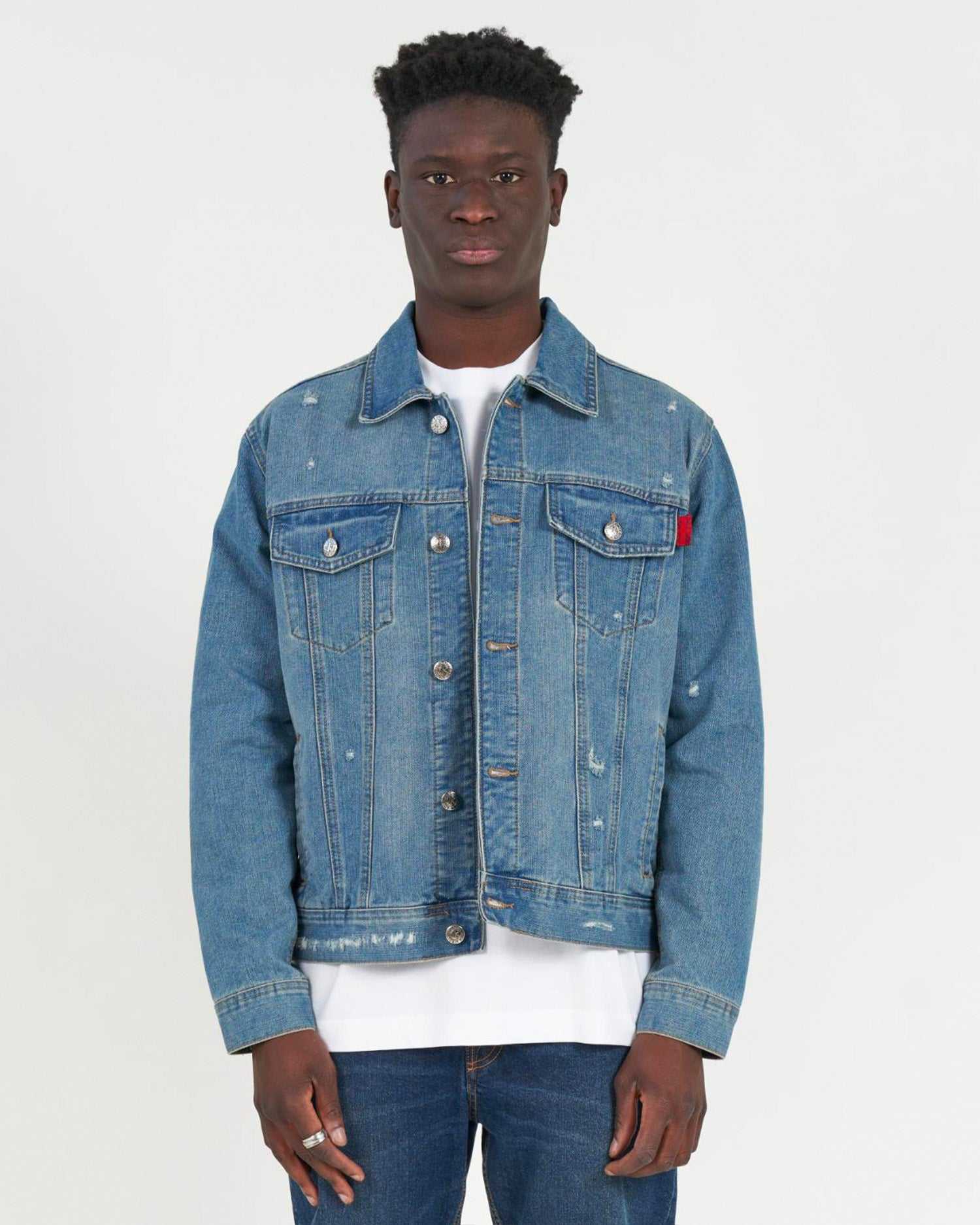 John Richmond Giubbino in denim con il logo ricamato sul retro sconto