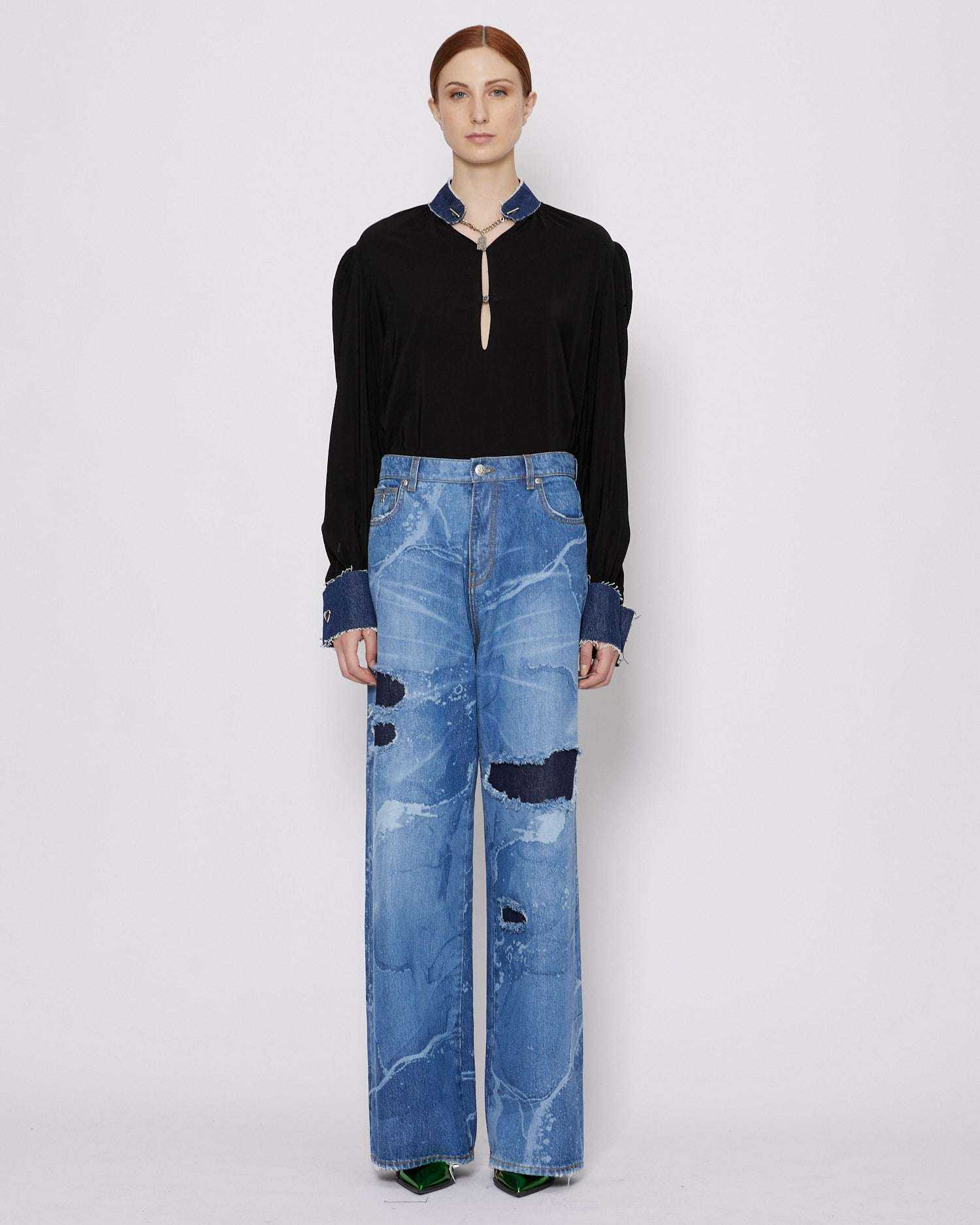 John Richmond Jeans gamba larga con strappi sul davanti sconto